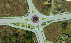 The proposed restaurant will be built SW of the roundabout. The access road will run through the parking lot.