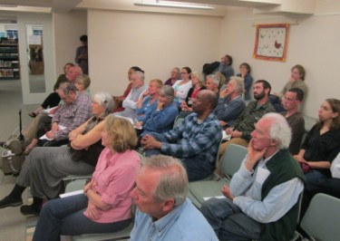 Housing 101 attendees in the downstairs program room of the Vineyard Haven public library.