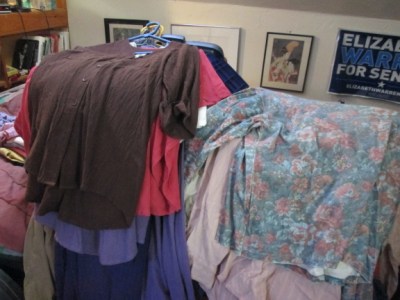 Right: Winter clothes coming out of hiding. Left: Summer clothes going in. The storage boxes are underneath. My clothes piles are not that big.