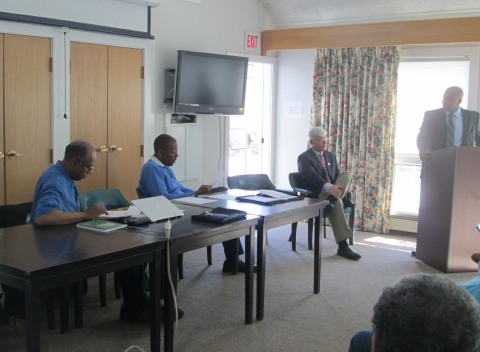 From left: M.V. Dems president Ewell Hopkins, forum moderator Joe Carter, candidate Robert Ogden, and candidate Marc Rivers (at the podium).